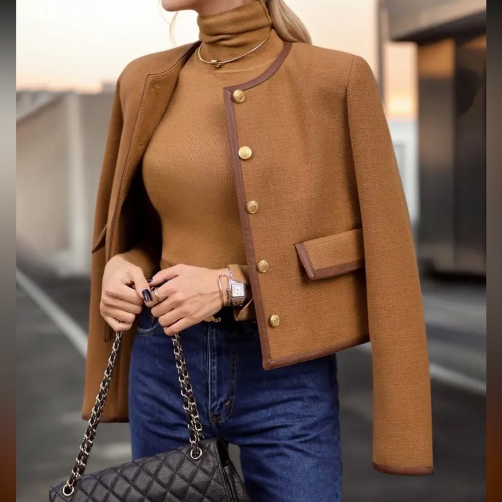 Woman’s vintage jacket with gold buttons